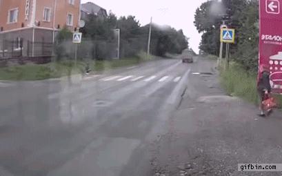 Woman crossing the street causes accident